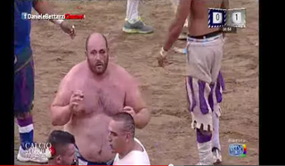 Illustration for article titled Crazy-Ass Italian Sport Combines Rugby With Bare-Knuckle Fighting